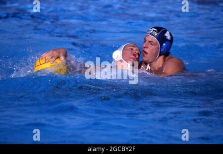 WATER POLO IS A COMPETETIVE TEAM SPORT PLAYED IN WATER. SEEN HERE A GAME IN PROGRESS, NSW, AUSTRALIA. Stock Photo