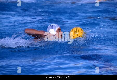 WATER POLO IS A COMPETETIVE TEAM SPORT PLAYED IN WATER. SEEN HERE A GAME IN PROGRESS, NSW, AUSTRALIA. Stock Photo
