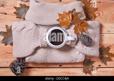 A cozy autumn day. Cold autumn morning with cup of coffee. Fall autumn weekend, leisure, mental day off, relaxing at home Stock Photo