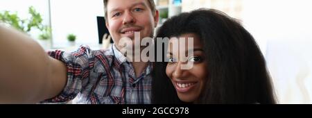 Man and woman are taking selfie closeup Stock Photo