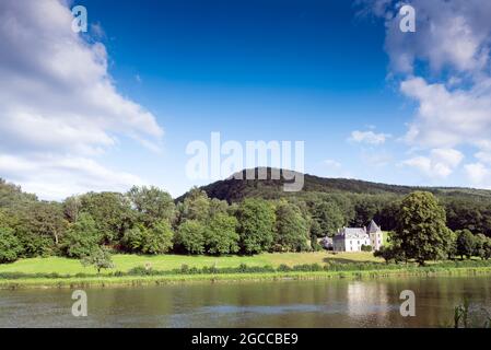 large mansion near river maas in countryside of french ardennes in tyhe north of france Stock Photo