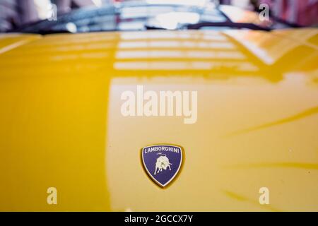 Bucharest, Romania - August 7, 2021: Shallow depth of field (selective focus) details of a yellow convertible Lamborghini sports car. Stock Photo