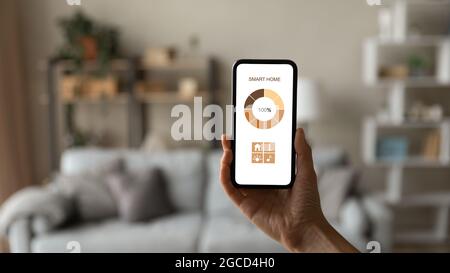 Close up woman holding smartphone with white empty screen mockup Stock Photo
