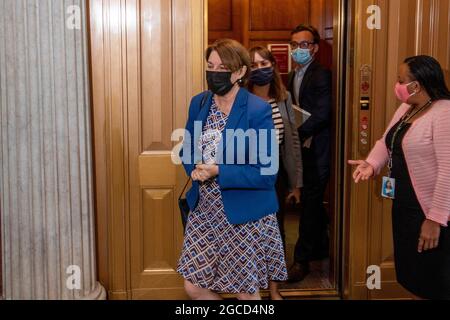 United States Senator Amy Klobuchar (Democrat of Minnesota) arrives at the Senate chamber for a vote at the US Capitol in Washington, DC, Saturday, August 7, 2021. Credit: Rod Lamkey / CNP Stock Photo