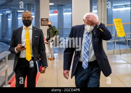 United States Senator Bernie Sanders (Independent of Vermont) walks through the Senate subway at the US Capitol for a vote in Washington, DC, Saturday, August 7, 2021. Credit: Rod Lamkey / CNP Stock Photo