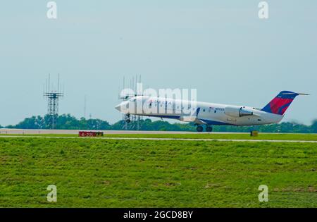 Delta Airlines Canadair Regional Jet CRJ-200 taking off from Lexington Bluegrass Airport Stock Photo