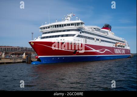 Helsinki / Finland - MAY 10, 2020: A large RORO-ferry MV Viking XPRS, operated by Viking Line, moored at the Katajanokka commercial port. Stock Photo