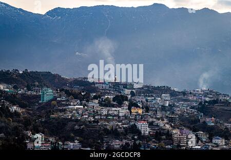 tawang city view from mountain top at dawn from flat angle image is taken at tawang arunachal pradesh india. Stock Photo