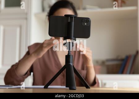 Modern smartphone shoot coach talk on video call Stock Photo