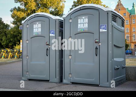 Two Bajamaja portable toilets, accessible, with wheelchair or handicapped access. Helsinki, Finland. August 7, 2021. Stock Photo