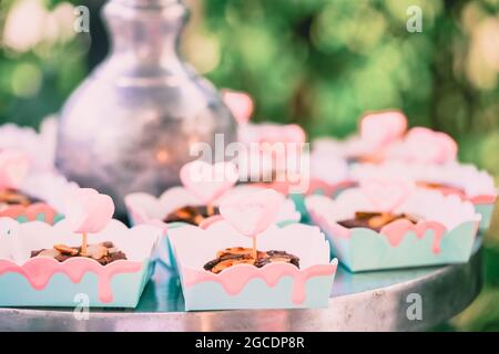 Selective focusing Brownie coating in paper bowl. Stock Photo