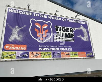 Oberhausen, Germany - July 9. 2021: View on banner of tiger jump trampoline park Stock Photo