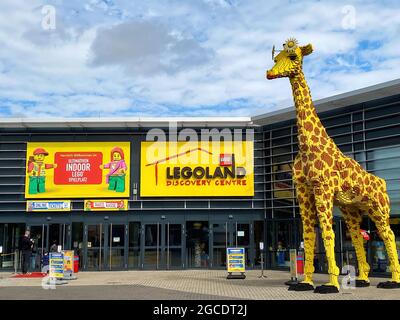 Oberhausen (Centro), Germany - July 9. 2021: View on entrance of Legoland with blue sky in summer with big lego giraffe Stock Photo