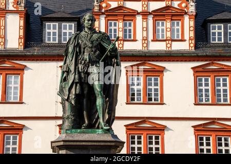 Coburg, Germany, July 17, 2021. Monument to Prince Albert of Saxe-Coburg Gotha, Duke of Saxony, Marktplatz square and historic town house, Coburg, Upp Stock Photo