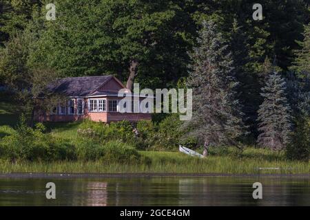 Northwoods cabin located on Barber Lake in northern Wisconsin. Stock Photo