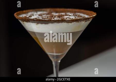 Alcoholic coffee cocktail with a nutty note and fluffy milk foam, creamy and sweet drink Stock Photo