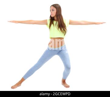 Young beautiful fitness girl doing yoga exercise isolated on white