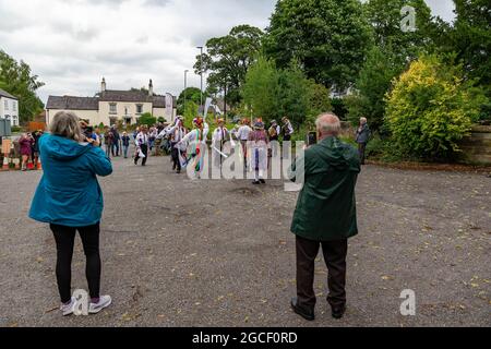 Warrington, UK. 08th Aug, 2021. The ancient tradition of Lymm Rushbearing has been revived with a procession from the village centre, gathering near the Lower Dam about 4 pm, and then processing up the Dingle. The festival ended with a service at St Mary's Church Credit: John Hopkins/Alamy Live News Stock Photo