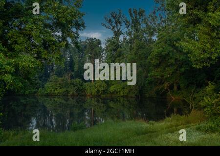 Fog and river Dyje with orange color sunrise near Bulhary village in south Moravia Stock Photo