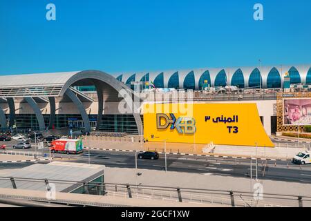 24 February 2021, Dubai, UAE: Entrance to the terminal of modern Dubai DXB Airport. Airline hub concept Stock Photo