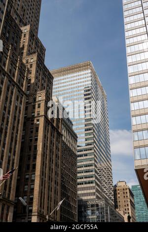 300 Madison Avenue is a modern tower whose mirror glass facade is ...