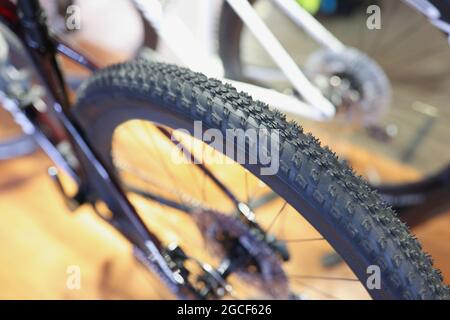 Reliable tire with quality tread on bicycle wheel closeup Stock Photo
