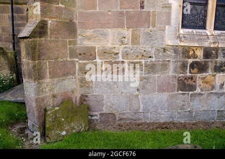 Church wall of All Saints' Church, Ripley showing Civil War musket ball holes on 8th July 2008 Stock Photo