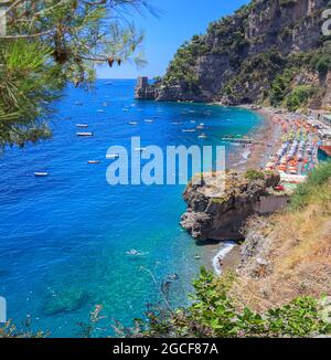 The beach of Fornillo is one of the main beaches of Positano on the Amalfi Coast, in Campania. It's small, composed of sand mixed with pebbles. Stock Photo