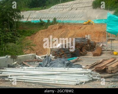 Amaga, Antioquia, Colombia - July 18 2021: Miscellaneous Building Materials for Construction and Heavy Goods Vehicle Stock Photo