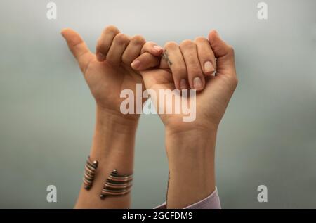 gesture of friendship with hands Stock Photo