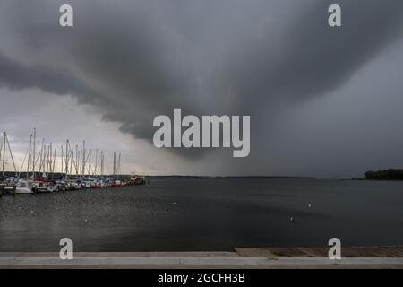 Storm clouds over the yacht harbor in the Salzhaff of Rerik at the Baltic Sea Mecklenburg-Vorpommern, Germany, copy space, selected focus Stock Photo