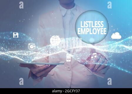Text sign showing Listless Employee. Concept meaning an employee who having no energy and enthusiasm to work Lady In Uniform Holding Tablet In Hand Stock Photo