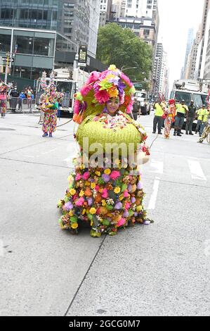 People dressed as Diablos Cojuelos attend the Dominican Day Parade on August 8, 2021 on the Avenue of the Americas in New York, New York. Robin Platzer/ Twin Images/ Credit: Sipa USA/Alamy Live News Stock Photo