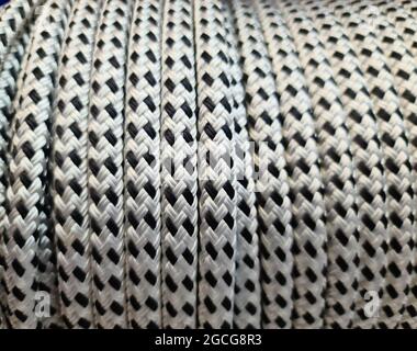 Selective focus close up rope background. Low light rope texture. Horizontal gradient pattern Stock Photo