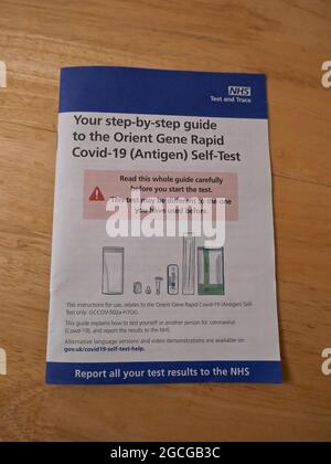 Finally the New Orient Gene Rapid Test available from the NHS  gov.uk/covid19-self-test site only requires people using it to swab both nostrils . No longer is the unpleasant throat swab required . The tests are 99% accurate and look a bit like a pregnancy test a bit like the original Antigen tests but are much better manufactured , the new tests come in green boxes instead of blue the whole kit is better made the cotton swab is slightly bigger and softer material . The results show in just a few minutes ... Stock Photo