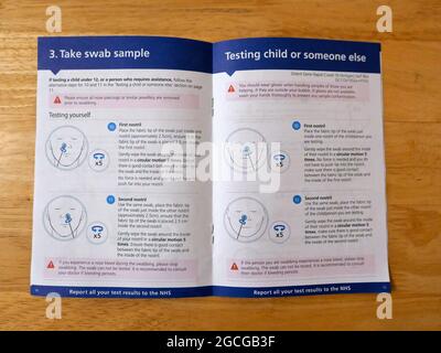 Finally the New Orient Gene Rapid Test available from the NHS  gov.uk/covid19-self-test site only requires people using it to swab both nostrils . No longer is the unpleasant throat swab required . The tests are 99% accurate and look a bit like a pregnancy test a bit like the original Antigen tests but are much better manufactured , the new tests come in green boxes instead of blue the whole kit is better made the cotton swab is slightly bigger and softer material . The results show in just a few minutes ... Stock Photo