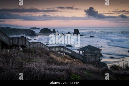 Stairs going down to the beach in Bandon, Oregon Stock Photo