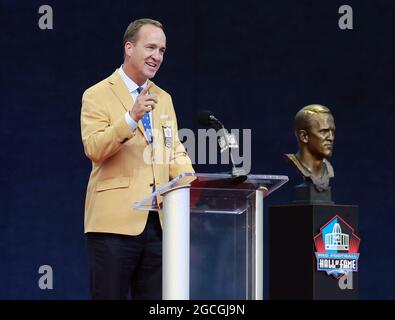 Canton, United States. 08th Aug, 2021. Class of 2021 inductee, Peyton Manning, speaks during his enshrinement into the Pro Football Hall of Fame at Tom Benson Hall of Fame Stadium in Canton, Ohio on Sunday, August 8, 2021. Photo by Aaron Josefczyk/UPI Credit: UPI/Alamy Live News Stock Photo