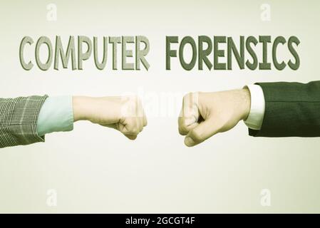 Hand writing sign Computer Forensics. Business approach the investigative analysis techniques on computers Two Professional Well-Dressed Corporate Stock Photo