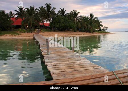 pier leading to island resort in tonga Stock Photo