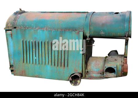 Rusty retro  small  tractors  diesel engine painted  blue. Isolated on white Stock Photo