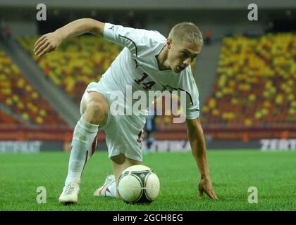 BUCHAREST, ROMANIA - AUGUST 9, 2012: Mihai Roman of Rapid pictured in action during the second leg of the 2012/13 UEFA Europa League Third Qualifying Round game between Rapid Bucuresti and FC Heerenveen at National Arena. Stock Photo