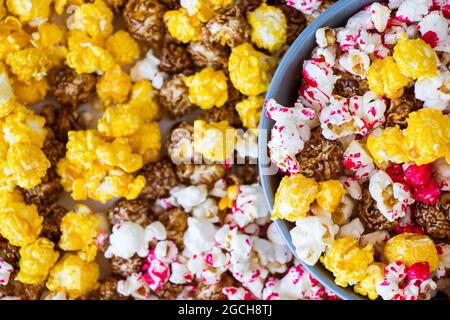 Sweet fried popcorn in bowl on the white background Stock Photo