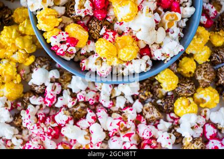 Sweet fried popcorn in bowl on the white background Stock Photo
