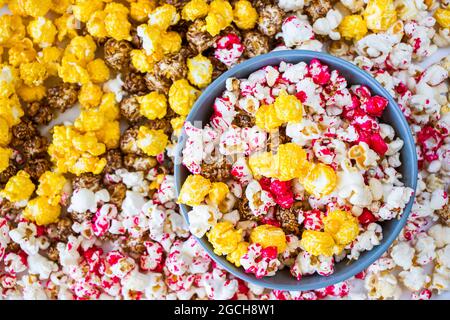 Sweet fried popcorn in bowl on the white background Stock Photo