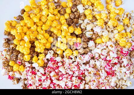 Sweet fried popcorn in bowl on the white background Stock Photo