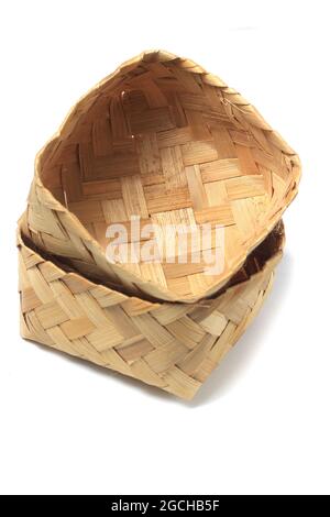 Besek, a Woven Bamboo Box from Indonesia, with Red and White Ribbon ... image.