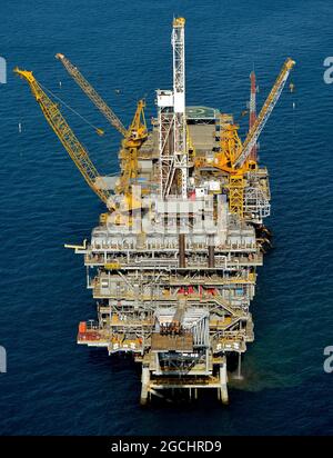 Drilling rig and stacked drilling pipes on an offshore platform in Bass Strait Australia