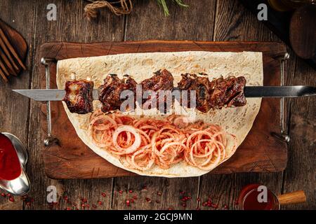 Grilled georgian lamb ribs shashlik skewers Stock Photo