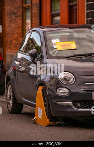 Untaxed Vehicle Clamped by DVLA Stock Photo